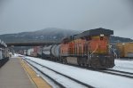 BNSF 6597 shoving hard on the hind end of a westbound leaving Whitefish, MT